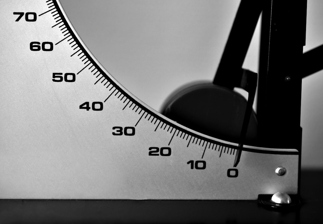 A dial gauge and precision measuring instruments on an engineer's bench